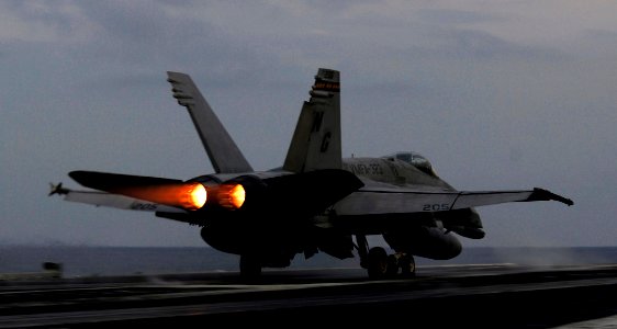US Navy 090504-N-6538W-161 An F-A-18C Hornet from the Death Rattlers of Marine Strike Fighter Squadron (VMFA) 323 launches from the aircraft carrier USS John C. Stennis (CVN 74)