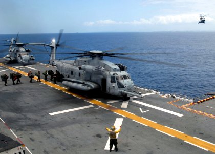 US Navy 090504-N-9950J-056 Marines assigned to the 31st Marine Expeditionary Unit (31st MEU) board a CH-53E Sea Stallion helicopter as the Aviation Combat Element (ACE) disembarks the forward-deployed amphibious assault ship US