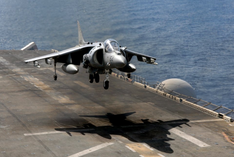 US Navy 090503-N-6639M-013 An AV-8B Harrier assigned to Medium Helicopter Squadron (HMM) 163 conducts flight operations aboard the amphibious assault ship USS Boxer (LHD 4)