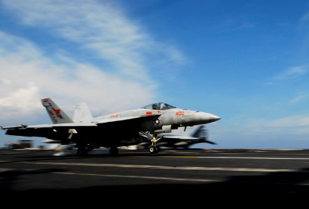 US Navy 090506-N-9928E-163 An F-A-18E Super Hornet from the Argonauts of Strike Fighter Squadron (VFA) 147 lands aboard the aircraft carrier USS John C. Stennis (CVN 74)