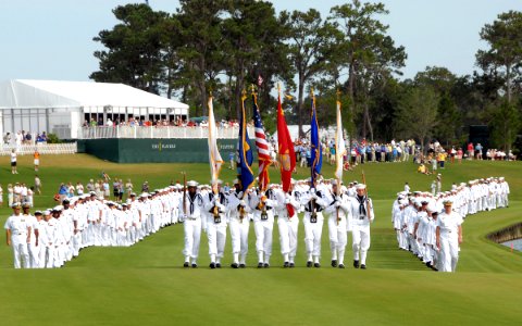 US Navy 090506-N-2821G-093 Sailors march on the 18th fairway during Military Appreciation Day during The Players Championship golf tournament at TPC Sawgrass photo
