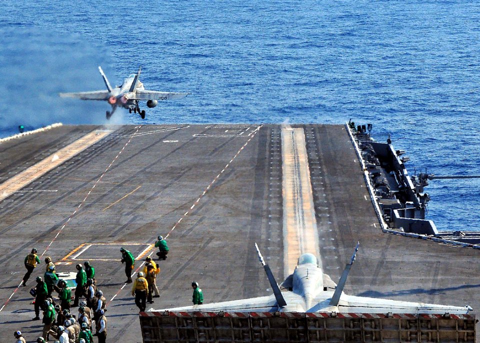 US Navy 090509-N-6233C-186 PACIFIC OCEAN (May 9, 2009) An F-A-18C Hornet from the Golden Dragons of Strike Fighter Squadron (VFA) 192 launches from the aircraft carrier USS George Washington (CVN 73)