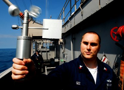 US Navy 090508-N-9928E-032 PACIFIC OCEAN (May 8, 2009) Aerographer's Mate 2nd Class Derron Gee, from East Haven, N.Y., uses a handheld anemometer to determine wind speed