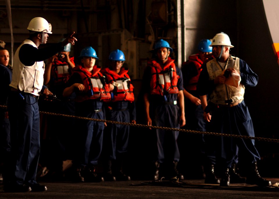US Navy 090508-N-7282P-011 Sailors aboard the aircraft carrier USS George Washington (CVN 73) discuss plans before receiving cargo from the Military Sealift Command fleet replenishment oiler USNS John Ericsson (T-AO 194)