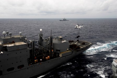 US Navy 090507-N-2475A-154 An SA-330 Puma helicopter assigned to the Military Sealift Command combat support ship USNS Concord (T-AFS 5) lifts pallets from Concord's flight deck to deliver to the Ticonderoga-class guided-missil