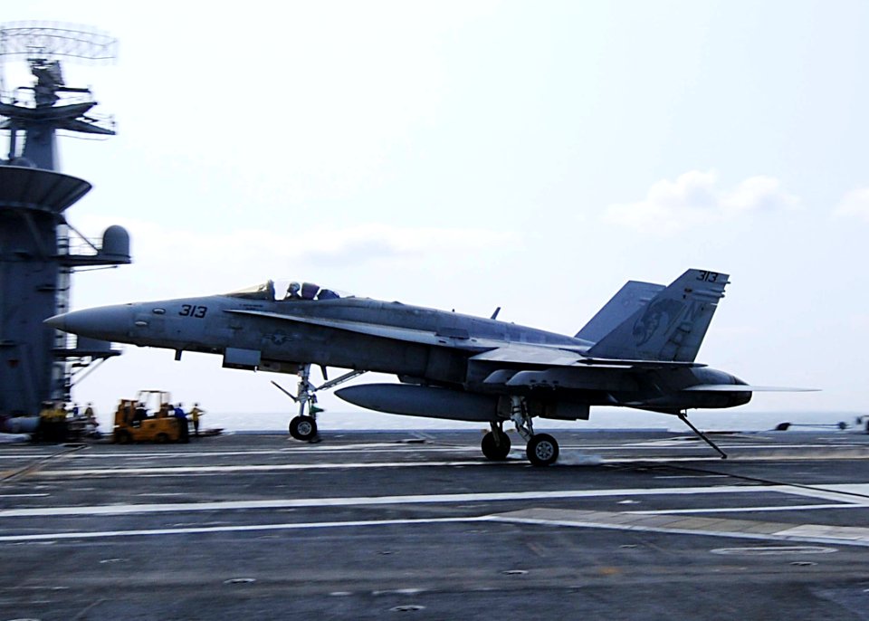 US Navy 090509-N-1062H-067 PACIFIC OCEAN (May 9, 2009) An F-A-18C Hornet from the Golden Dragons of Strike Fighter Squadron (VFA) 192 lands aboard the aircraft carrier USS George Washington (CVN 73)