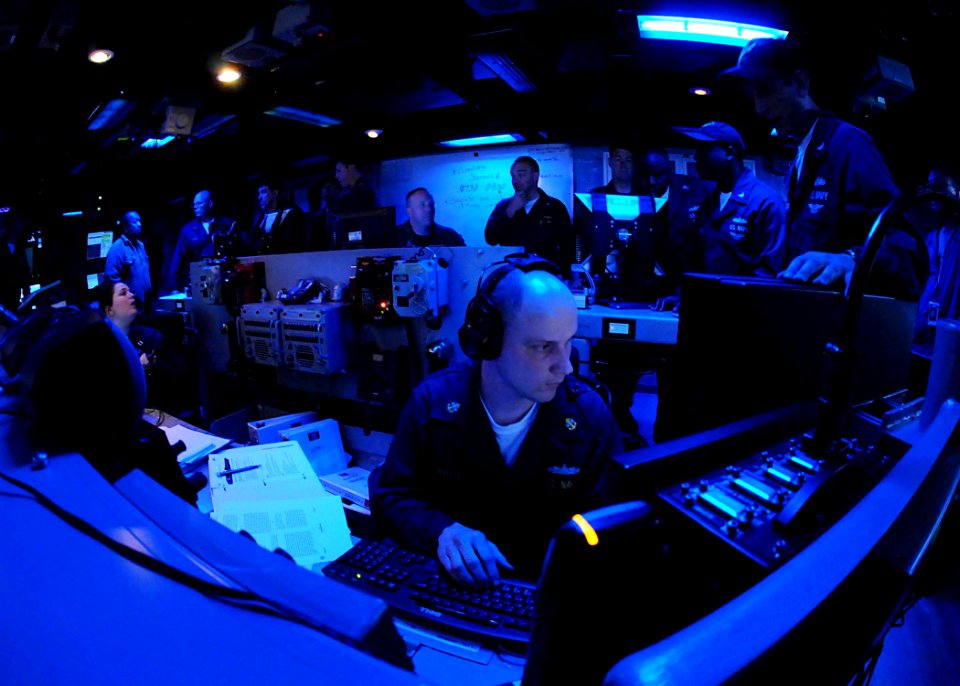 US Navy 090507-N-1062H-054 Operations Specialist Chief Jason House participates in a detect and engage exercise in the Combat Direction Center aboard the aircraft carrier USS George Washington (CVN 73)