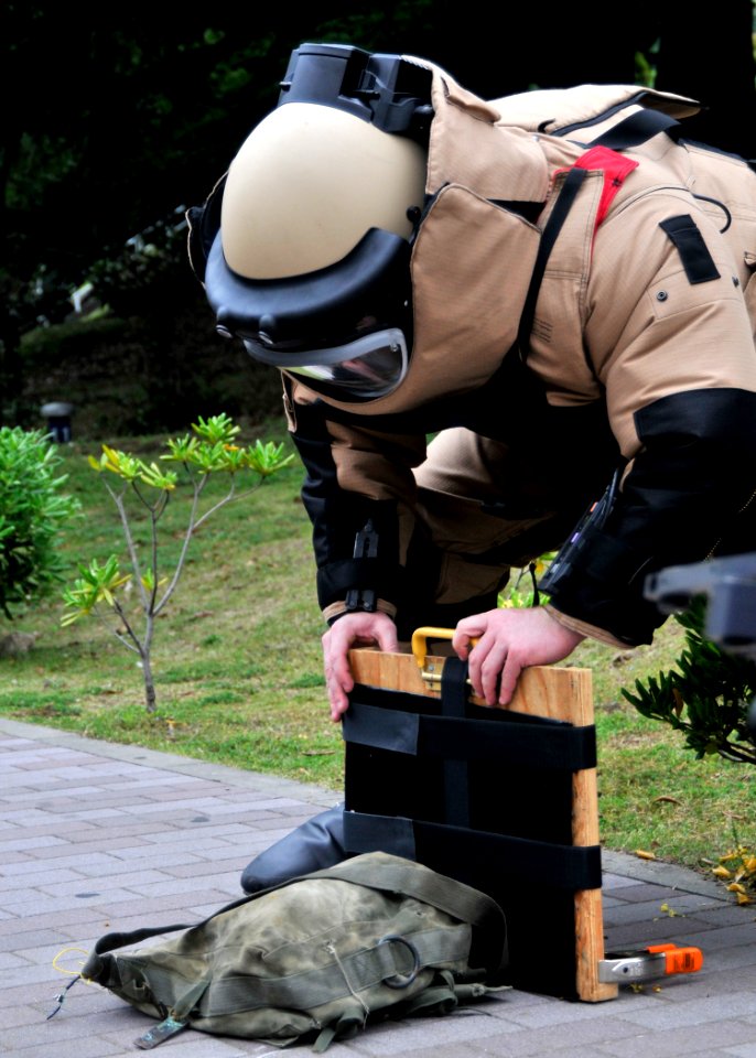 US Navy 090512-N-2013O-070 xplosive Ordnance Disposal Technician 1st Class Taylor King, from Concorde, N.C., a member of Explosive Ordnance Disposal Mobile Unit 5, Det. Japan, prepares X-rays a simulated improvised explosive de