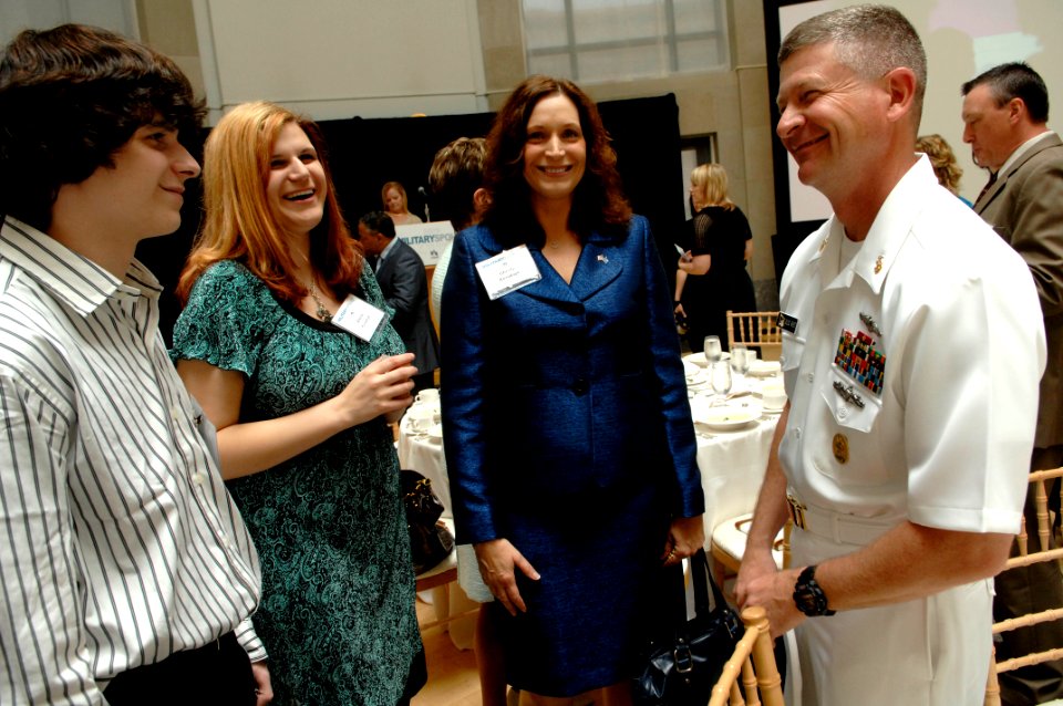 US Navy 090507-N-9818V-033 Master Chief Petty Officer of the Navy (MCPON) Rick West speaks with Christy Huriantnyk and her children, before the 2009 Military Spouse of the Year Awards Luncheon