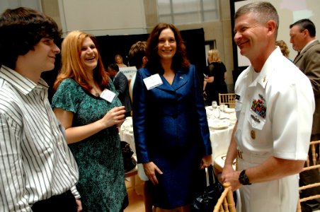 US Navy 090507-N-9818V-033 Master Chief Petty Officer of the Navy (MCPON) Rick West speaks with Christy Huriantnyk and her children, before the 2009 Military Spouse of the Year Awards Luncheon