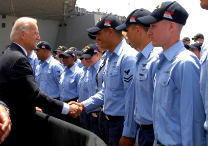 US Navy 090514-N-5586R-002 Vice President Joe Biden shakes hands on the pier with Sailors from Nitmitz class aircraft carrier USS Ronald Reagan (CVN 76)