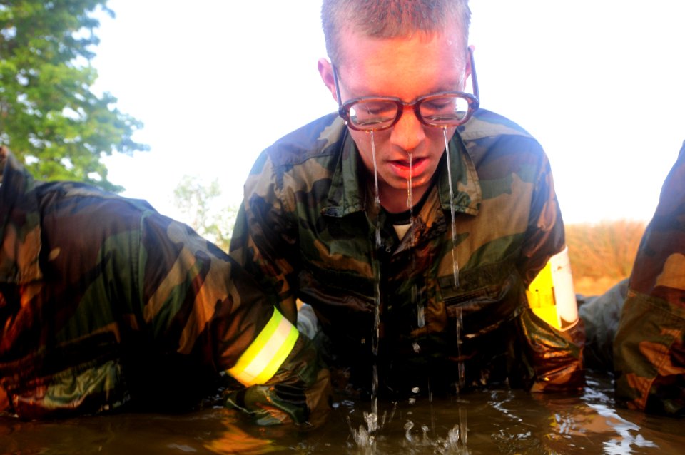 US Navy 090512-N-4565G-946 ANNAPOLIS, Md. (May 12, 2009) Midshipman 4th Class James Brigham conducts physical training along the shore of the Severn River during the Naval Academy Sea Trials