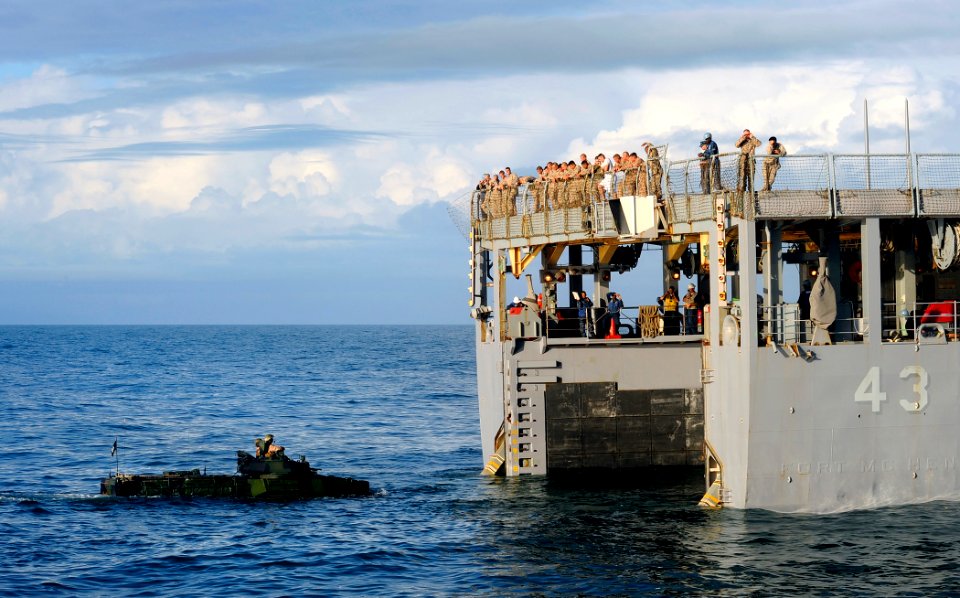 US Navy 090515-N-5345W-291 An amphibious assault vehicle from the 22nd Marine Expeditionary Unit (22 MEU) prepares to enter the well deck of the amphibious dock landing ship USS Fort McHenry (LSD 43)