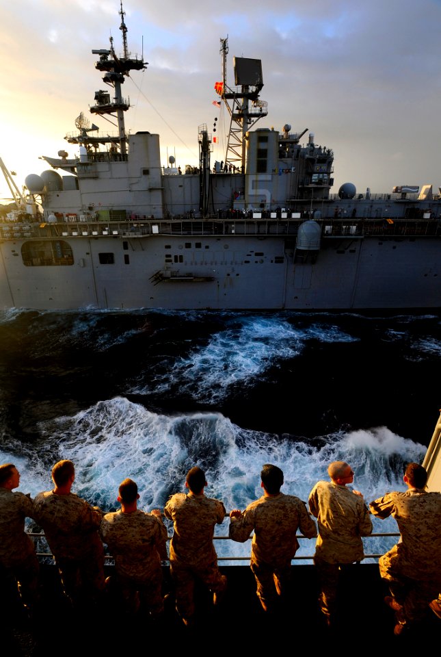US Navy 090518-N-5345W-104 Marines from the 22nd Marine Expeditionary Unit (22 MEU) gather on a port-side weather deck aboard the amphibious dock landing ship USS Fort McHenry (LSD 43)