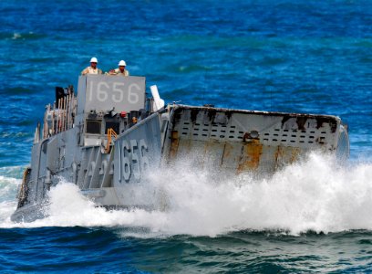 US Navy 090515-N-5345W-201 A landing craft unit (LCU) from Assault Craft Unit 2 (ACU 2) approaches the well deck of the Whidbey Island-class amphibious dock landing ship USS Fort McHenry (LSD 43) photo