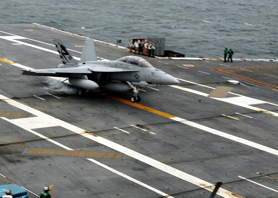 US Navy 090519-N-6125G-116 An F-A-18F Super Hornet assigned to Air Test and Evaluation Squadron (VX) 23 makes the first arrested landing aboard the aircraft carrier USS George H.W. Bush (CVN 77)