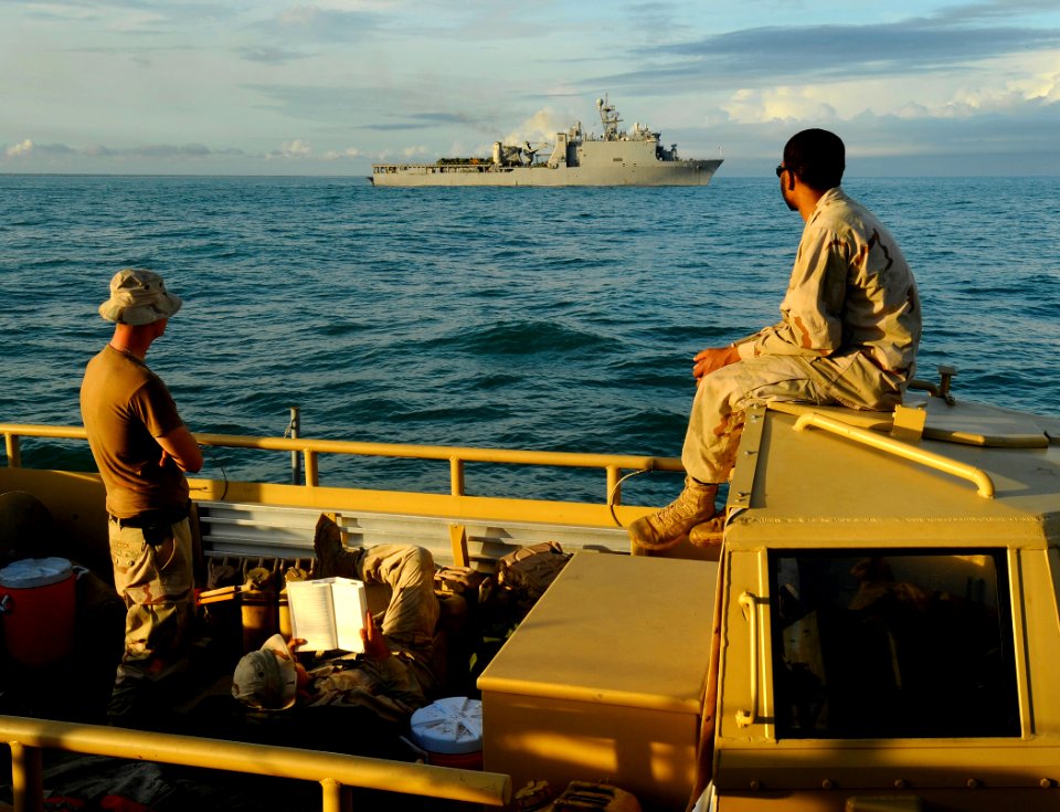 US Navy 090515-N-5345W-434 Sailors assigned to Beach Master Unit 2 (BMU 2) look out from atop a Lighter Amphibious Resupply Cargo(LARC) while aboard a landing craft unit