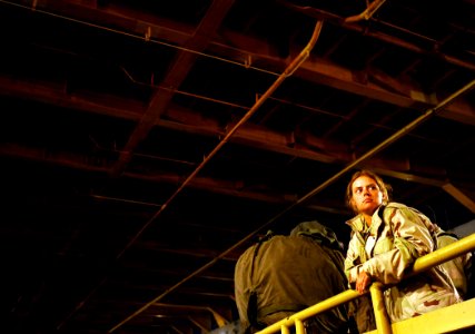 US Navy 090515-N-5345W-529 Construction Mechanic 2nd Class Heather Billings, assigned to Beach Master Unit 2 (BMU 2), watches from atop a Lighter Amphibious Resupply Cargo (LARC)