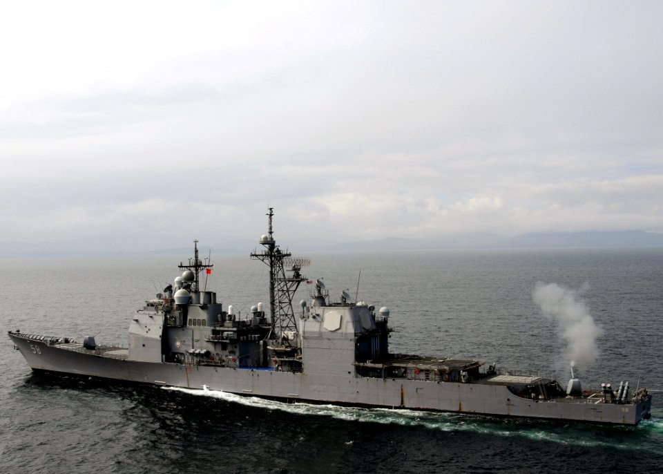 US Navy 090518-N-4275C-010 The guided-missile cruiser USS Philippine Sea (CG 58) fires a five-inch gun during a naval surface fire support certification