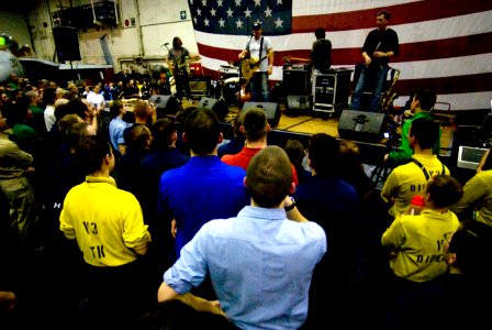 US Navy 090517-N-3541A-048 Platinum-selling recording artist Edwin McCain speaks with the crew of the aircraft carrier USS John C. Stennis (CVN 74) during a concert in the ship's hangar bay