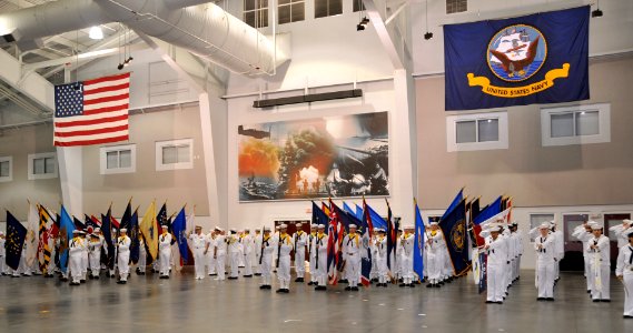 US Navy 090515-N-8848T-427 Rear Adm. Robert D. Reilly, Jr., Commander, Military Sealift Command, salutes during his entrance at the beginning of recruit graduation at Recruit Training Command