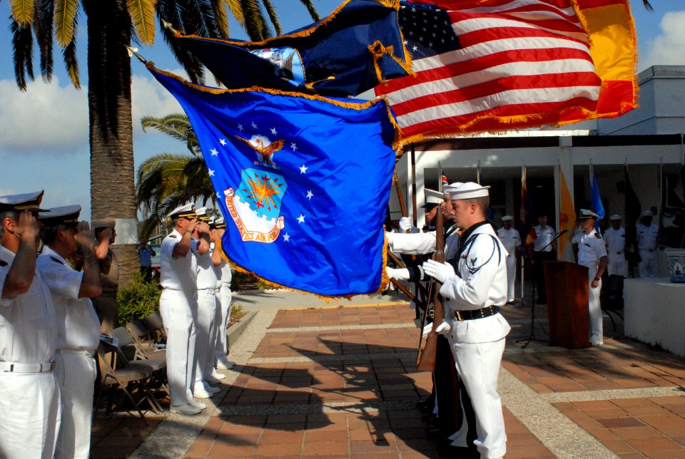 US Navy 090521-N-1825E-260 he Naval Station Rota Joint Color Guard parades the colors during a Memorial Day ceremony at the base Chapel