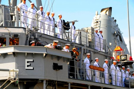 US Navy 090522-N-0640K-054 Sailors aboard the mine countermeasures ship USS Devastator (MCM 6) wait to debark their ship after arriving at the ship's new homeport at Naval Base San Diego