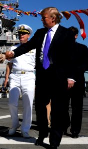 US Navy 090521-N-8907D-127 Donald Trump, Chairman and CEO of the Trump Organization, tours the flight deck of the amphibious assault ship USS Iwo Jima (LHD 7) during Fleet Week New York City 2009 (cropped)