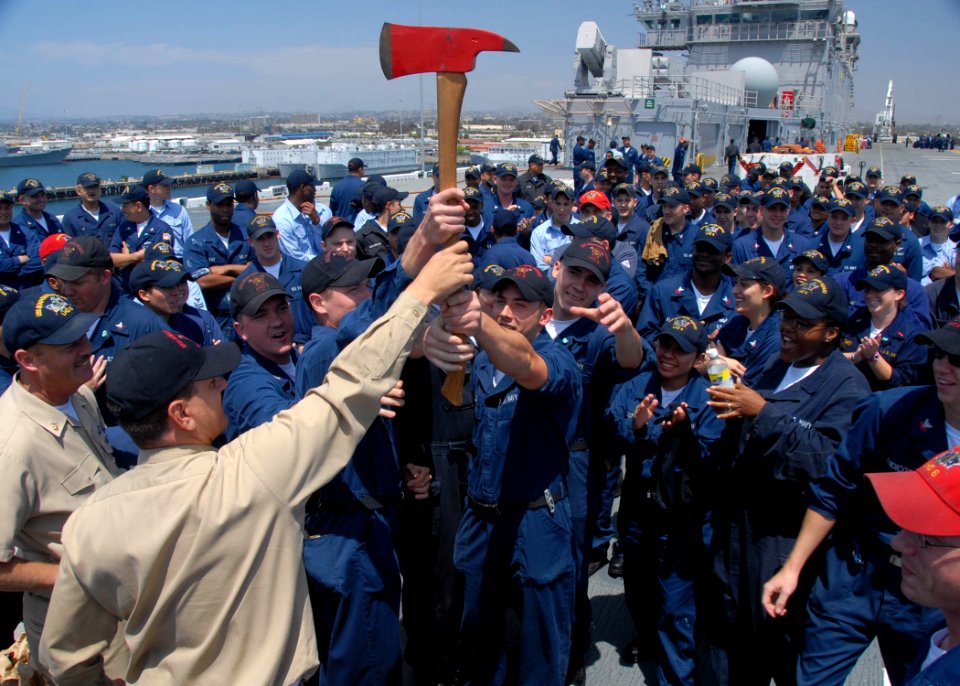 US Navy 090522-N-0515W-089 Sailors from Repair 5 Main hold up the trophy ax after winning the Damage Control Olympics aboard the amphibious assault ship, USS Bonhomme Richard (LHD 6)