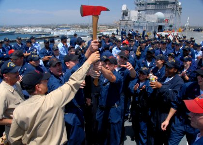 US Navy 090522-N-0515W-089 Sailors from Repair 5 Main hold up the trophy ax after winning the Damage Control Olympics aboard the amphibious assault ship, USS Bonhomme Richard (LHD 6)