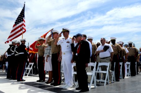 US Navy 090522-N-3595W-022 Military active and retired service members salute the colors during a wreath laying ceremony aboard the Intrepid Museum as part of Fleet Week New York 2009