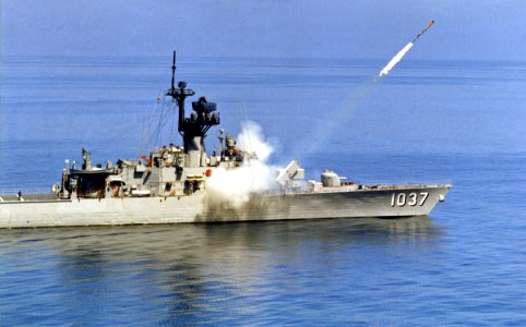 USS Bronstein (FF-1037) firing a RUR-5 ASROC, circa in the 1980s (S-550-G)