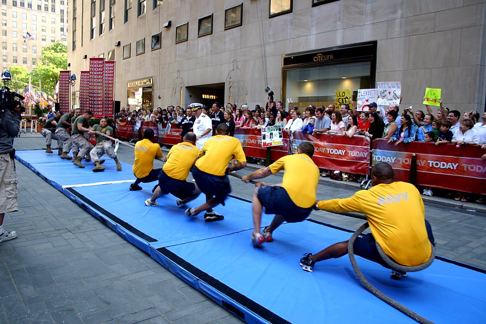 US Navy 090523-N-3088S-012 Sailors assigned to the amphibious assault ship USS Iwo Jima (LHD 7) and Marines from Camp Lejeune, N.C. participate in a tug-of-war match during the taping of the Today Show