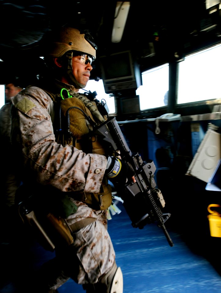 US Navy 090526-N-5345W-131 A member of the visit, board, search and seizure team assigned to the 22nd Marine Expeditionary Unit (22 MEU) conducts a non-compliant merchant vessel drill