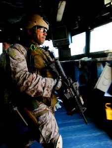 US Navy 090526-N-5345W-131 A member of the visit, board, search and seizure team assigned to the 22nd Marine Expeditionary Unit (22 MEU) conducts a non-compliant merchant vessel drill