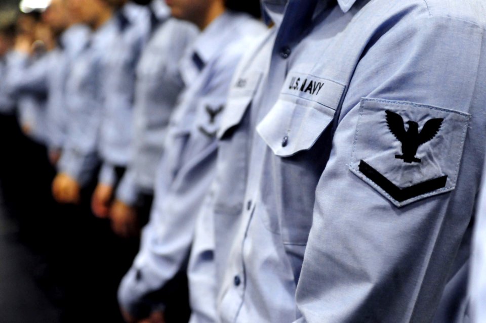 US Navy 090525-N-0684R-011 Newly selected 3rd Class Petty Officers stand in formation prior to a frocking ceremony in the hangar bay of the aircraft carrier USS John C. Stennis (CVN 74)