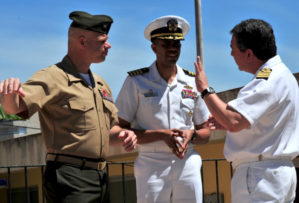 US Navy 090528-N-9740S-180 Col. Gareth Brandl, commanding officer of the 22D Marine Expeditionary Unit, and Capt. Sam Howard, commanding officer of the amphibious assault ship USS Bataan (LHD 5), visit with a Spanish Navy Capt