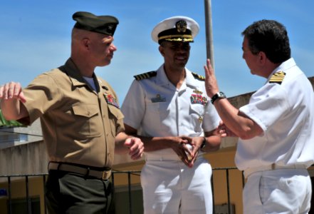 US Navy 090528-N-9740S-180 Col. Gareth Brandl, commanding officer of the 22D Marine Expeditionary Unit, and Capt. Sam Howard, commanding officer of the amphibious assault ship USS Bataan (LHD 5), visit with a Spanish Navy Capt photo