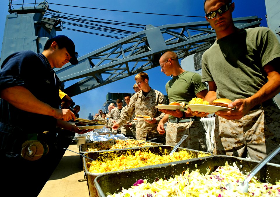 US Navy 090525-N-5345W-039 Sailors and Marines aboard the amphibious dock landing ship USS Fort McHenry (LSD 43) participate in a Memorial Day steel beach picnic