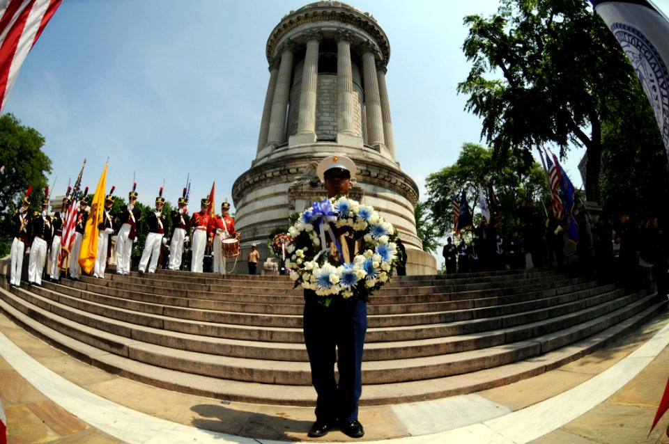 US Navy 090525-N-8907D-270 Lance Cpl. Seth Byas, from the Harlem Youth Marine Corps, holds a wreath being dedicated for the Memorial Day ceremony