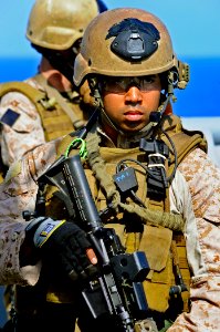 US Navy 090526-N-5345W-152 A member of the visit, board, search and seizure team assigned to the 22nd Marine Expeditionary Unit (22 MEU) conducts a non-compliant merchant vessel drill photo