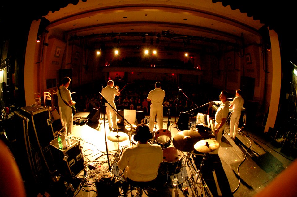 US Navy 090527-N-7975R-009 The Naval Academy Band, the Electric Brigade, performs for students at Irondequoit High School in Rochester