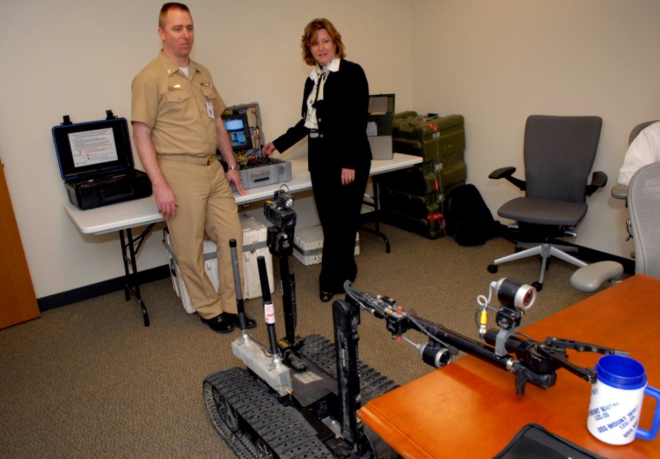 US Navy 090528-N-7676W-062 Master Chief Steve French and Laura Smith operate a Talon EOD robot during an Office of Naval Research Technical Solutions demonstration of the recently completed battery replacement project