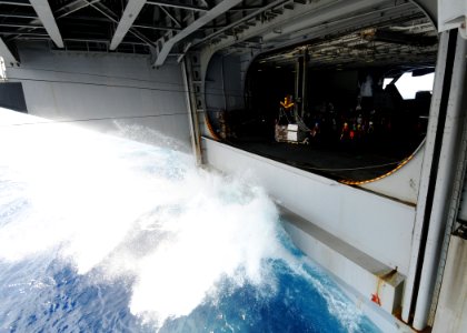 US Navy 090529-N-1062H-084 Supply and deck department Sailors retrieve cargo from the Military Sealift Command dry cargo-ammunition ship USNS Richard E. Byrd (T-AKE 4)