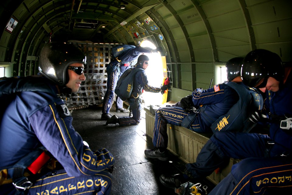 US Navy 090529-N-3271W-092 Members of the U.S. Navy demonstration parachute team, the Leap Frogs, prepare to jump from a 1942 commemorative Air Force C-47