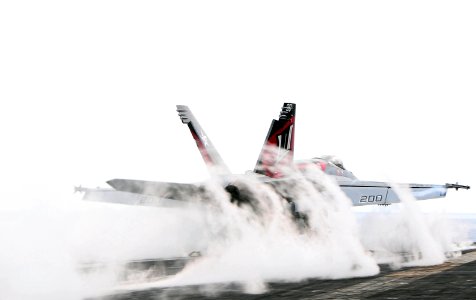 US Navy 090530-N-3946H-076 An F-A-18E Super Hornet launches off the aircraft carrier USS Nimitz (CVN 68) photo