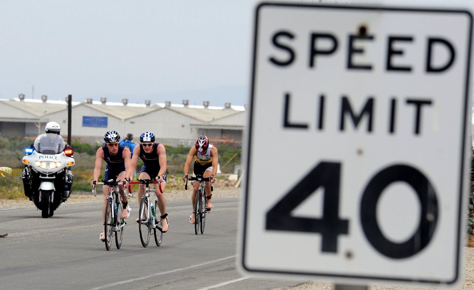 US Navy 090530-N-1722M-187 Ensign Derek Oskutis, front, leads a trio of bikers before the final turn during the Armed Forces Triathlon at Naval Base Ventura County