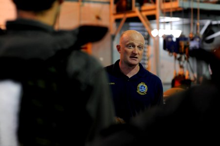 US Navy 090604-N-0413R-032 Hospital Corpsman 1st Class Sean Long reviews safety procedures for aviators about to board the new 9D6B Modular Egress Training System (METS) at the Aviation Survival Training Center in Jacksonville