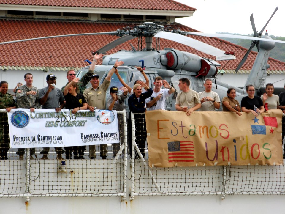 US Navy 090603-N-0000X-011 Service members embarked aboard the military Sealift Command hospital ship USNS Comfort (T-AH 20) wave as the ship makes her way through the Panama Canal