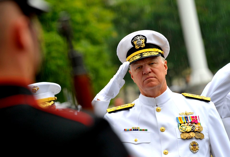 US Navy 090604-N-8273J-132 Chief of Naval Operations (CNO) Adm. Gary Roughead salutes members of the Navy and Marine Corps ceremonial guard during the Battle of Midway Commemoration Ceremony at the Navy Memorial in Washington